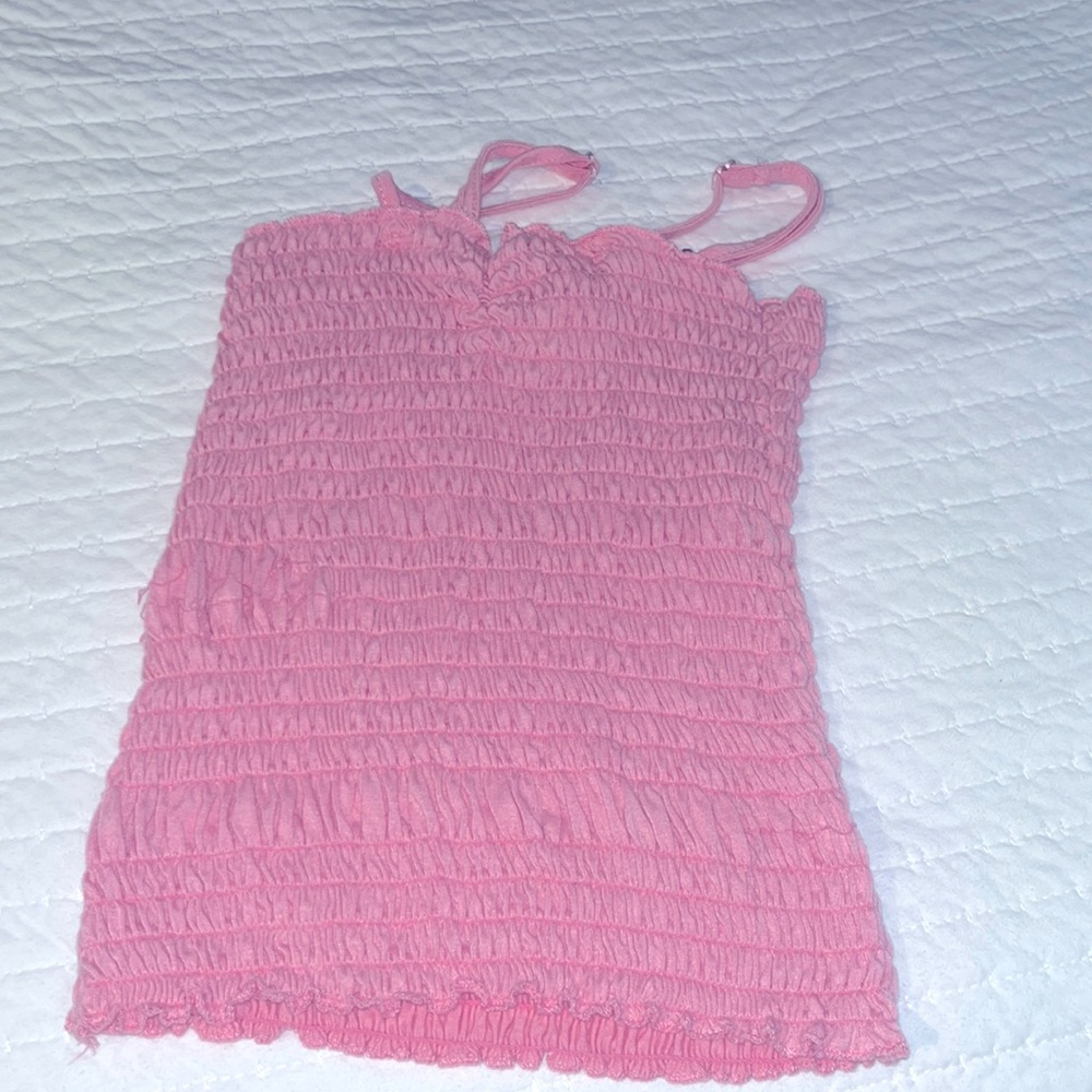Pink crop-top/tank-top.